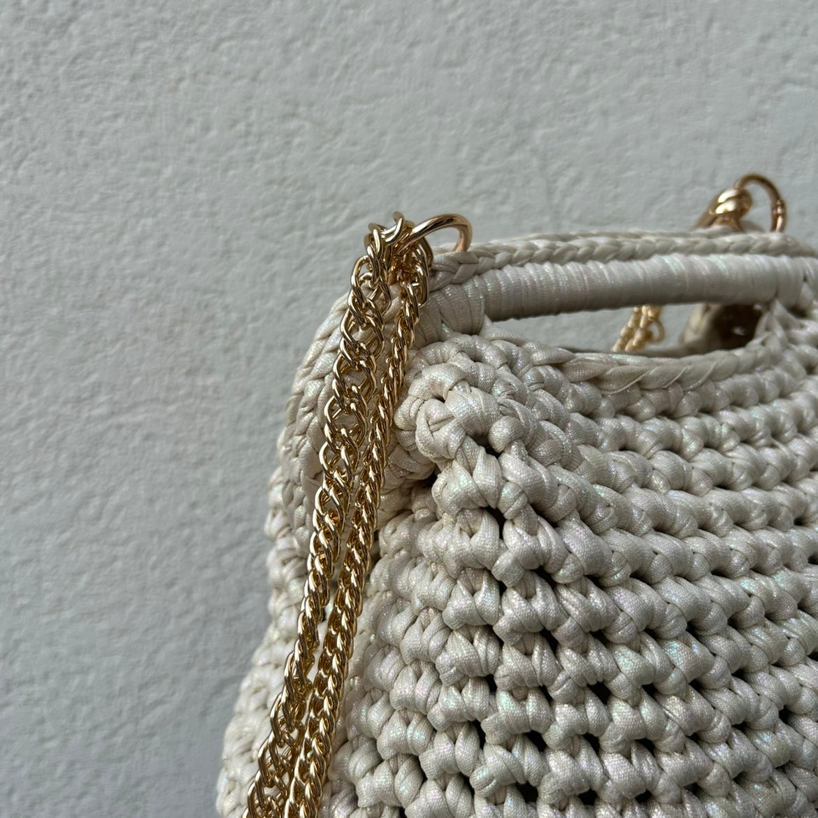 Clutch effetto boreale con catena